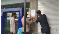 Polsek Pattallassang Pasang Maklumat Kapolri tentang Kepatuhan terhadap Protokol Kesehatan Dalam Pelaksanaan Liburan NATARU