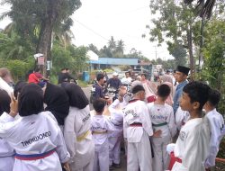 Ratusan Paket Takjil Dibagikan Oleh Atlet Taekwondo Binaan Aiptu Satria Dharma, Personil Polda Sumbar