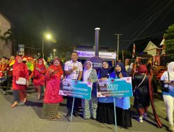 KAI Bawa Sejarah ke Jalanan: Kolaborasi Kreatif di Pawai Budaya Malam Kota Padang