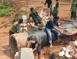 Satgas TMMD Ke-129 Kodim 0306/50 Kota Percepat Pemasangan Gorong-gorong Bersama Warga