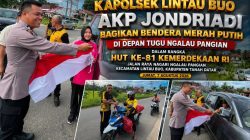 Kapolsek Lintau Buo AKP Jondriadi Ajak Warga Kibarkan Merah Putih, Semarak HUT ke-81 RI di Lintau Buo